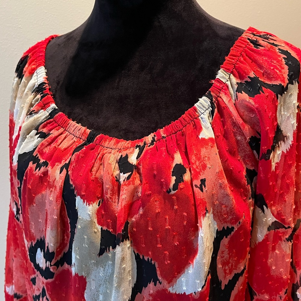 Dressy WHBM top with fun flare!